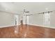 Large main bedroom with hardwood floors, updated lighting, and ensuite bathroom access at 3270 Brookview Dr, Marietta, GA 30068