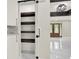 Open pantry with dark wood shelving, modern cabinets, and marble floors providing ample storage space at 3270 Brookview Dr, Marietta, GA 30068