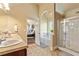 Bright main bathroom with double vanities, a soaking tub, and a separate shower at 532 Pelham Pl, Mcdonough, GA 30253