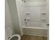 Clean and functional bathroom with a shower-tub combination and essential fixtures at 5383 Heron Bay Blvd, Locust Grove, GA 30248