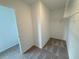 Functional walk-in closet with shelving, ideal for organizing clothes and accessories at 5383 Heron Bay Blvd, Locust Grove, GA 30248