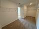Spacious walk-in closet featuring ample shelving for organized storage at 5383 Heron Bay Blvd, Locust Grove, GA 30248