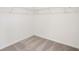 Walk in closet featuring carpet flooring and white shelving at 5383 Heron Bay Blvd, Locust Grove, GA 30248