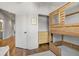 Bedroom featuring wood bunk beds, a neutral-toned dresser and a peek into an adjacent hallway at 613 Harrington Hls, Decatur, GA 30032