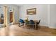 Bright dining room with hardwood floors and access to a private outdoor space at 613 Harrington Hls, Decatur, GA 30032