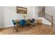 Open dining area with hardwood flooring and staircase at 613 Harrington Hls, Decatur, GA 30032