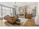 Bright living room with decorative fireplace and hardwood floors at 613 Harrington Hls, Decatur, GA 30032