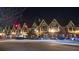 Street view of a neighborhood beautifully decorated with lights at night at 613 Harrington Hls, Decatur, GA 30032