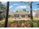Beautiful backyard featuring a patio area and well-maintained lawn at 6355 Marlow Dr, Cumming, GA 30041