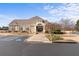 Exterior of the community clubhouse featuring well-kept landscaping and ample parking at 6355 Marlow Dr, Cumming, GA 30041