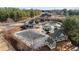 Aerial view of the community pool, clubhouse, splashpad, and covered seating areas at 6355 Marlow Dr, Cumming, GA 30041