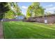 Expansive backyard with a well-kept lawn and a wooden fence at 2079 Nancy Se Cir, Smyrna, GA 30080