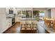 Updated kitchen with stainless steel appliances, granite countertops, an island with seating, and ample cabinet space at 2079 Nancy Se Cir, Smyrna, GA 30080
