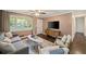 Comfortable living room with a contemporary sofa, stylish chairs, and a decorative rug, ideal for relaxation and gatherings at 2079 Nancy Se Cir, Smyrna, GA 30080