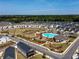 The community is designed with a central pool and playground surrounded by beautiful homes and green spaces at 4065 Holland Grove Rd, Lawrenceville, GA 30044