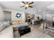 Open-concept living area connects to a modern kitchen with a large seating island at 4065 Holland Grove Rd, Lawrenceville, GA 30044