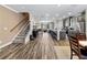 Open floor plan connecting kitchen, dining, and living area, great for entertaining and everyday living at 4065 Holland Grove Rd, Lawrenceville, GA 30044