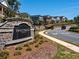 Charming townhomes line the street in Sweetwater Green neighborhood, with manicured lawns and welcoming entrances at 4065 Holland Grove Rd, Lawrenceville, GA 30044