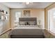 Staged bedroom with a neutral color palette, contemporary decor, and a ceiling fan at 715 Cowan Rd, Covington, GA 30016
