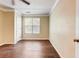 Bright bedroom with wood floors, natural light, and ample space for furnishings at 715 Cowan Rd, Covington, GA 30016