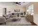 Stylish living room with hardwood floors, tasteful decor, and ample natural light at 715 Cowan Rd, Covington, GA 30016