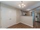 Charming dining area with modern lighting and easy access to the kitchen at 99 Ashtonbrook Dr, Mcdonough, GA 30252
