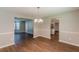 Dining space with new floors, paint and open access to kitchen and living room at 99 Ashtonbrook Dr, Mcdonough, GA 30252