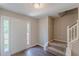 Bright foyer with hardwood floors, a staircase, a neutral color palette, and natural light at 99 Ashtonbrook Dr, Mcdonough, GA 30252