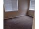 Bedroom with carpet and two windows with blinds at 3088 Balearic Dr, Marietta, GA 30067
