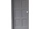 A gray interior door featuring six panels and a silver handle at 3088 Balearic Dr, Marietta, GA 30067
