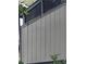 Exterior of a home featuring a gray siding design and dark framed windows at 3088 Balearic Dr, Marietta, GA 30067
