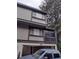 Exterior featuring two stories, a balcony, a two car garage, siding, and mature trees at 3088 Balearic Dr, Marietta, GA 30067
