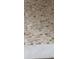 Close-up of floor tile design with a decorative style in a earth-tone color scheme at 3088 Balearic Dr, Marietta, GA 30067