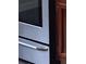 Stainless steel oven appliances next to cabinets at 3088 Balearic Dr, Marietta, GA 30067