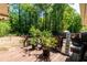 Backyard deck with plenty of space for outdoor dining and entertaining overlooking a private backyard at 3290 Custer Lake Nw Dr, Marietta, GA 30064