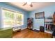 Bright bedroom with a view of the trees and hard wood floors and a convenient shoe rack to keep things tidy at 3290 Custer Lake Nw Dr, Marietta, GA 30064