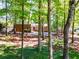Ranch style home with manicured front yard and mature trees at 3290 Custer Lake Nw Dr, Marietta, GA 30064