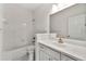 Clean bathroom with a vanity sink, modern fixtures, and tub with shower at 406 Vinings Forest Se Cir, Smyrna, GA 30080
