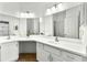Bathroom featuring double vanity, granite countertop and wall to wall mirrors at 406 Vinings Forest Se Cir, Smyrna, GA 30080