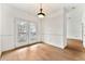 Dining area with hardwood floors and patio doors leading to an outdoor balcony at 406 Vinings Forest Se Cir, Smyrna, GA 30080