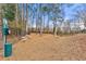 Pet-friendly community dog park with seating and waste disposal station at 406 Vinings Forest Se Cir, Smyrna, GA 30080