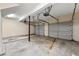 Spacious two car garage with automatic door openers and concrete floor at 406 Vinings Forest Se Cir, Smyrna, GA 30080