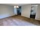 Inviting living room with a clear view to the kitchen and dining areas, great for entertaining guests at 5266 Long Green Ln, Stone Mountain, GA 30088
