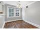 Bright dining area featuring hardwood flooring, natural lighting, and crown molding at 974 Greenwood Ne Ave # 6, Atlanta, GA 30306