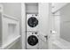 Convenient laundry area with stacked washer and dryer units at 974 Greenwood Ne Ave # 6, Atlanta, GA 30306