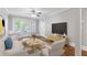 Bright living room featuring French doors, hardwood floors, and a contemporary design at 974 Greenwood Ne Ave # 6, Atlanta, GA 30306