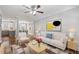 Living room boasts an open floor plan, blending modern décor with stylish hardwood floors at 974 Greenwood Ne Ave # 6, Atlanta, GA 30306