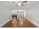 Open-concept living room featuring hardwood floors and neutral wall paint, enhancing the bright space at 974 Greenwood Ne Ave # 6, Atlanta, GA 30306