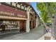 Charming restaurant exterior with a sidewalk view, showcasing outdoor dining and the building's unique architectural details at 974 Greenwood Ne Ave # 6, Atlanta, GA 30306