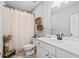 Neutral toned bathroom featuring a shower, a vanity sink with modern fixtures and decor at 104 Federal Path, Temple, GA 30179